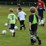 Children playing soccer